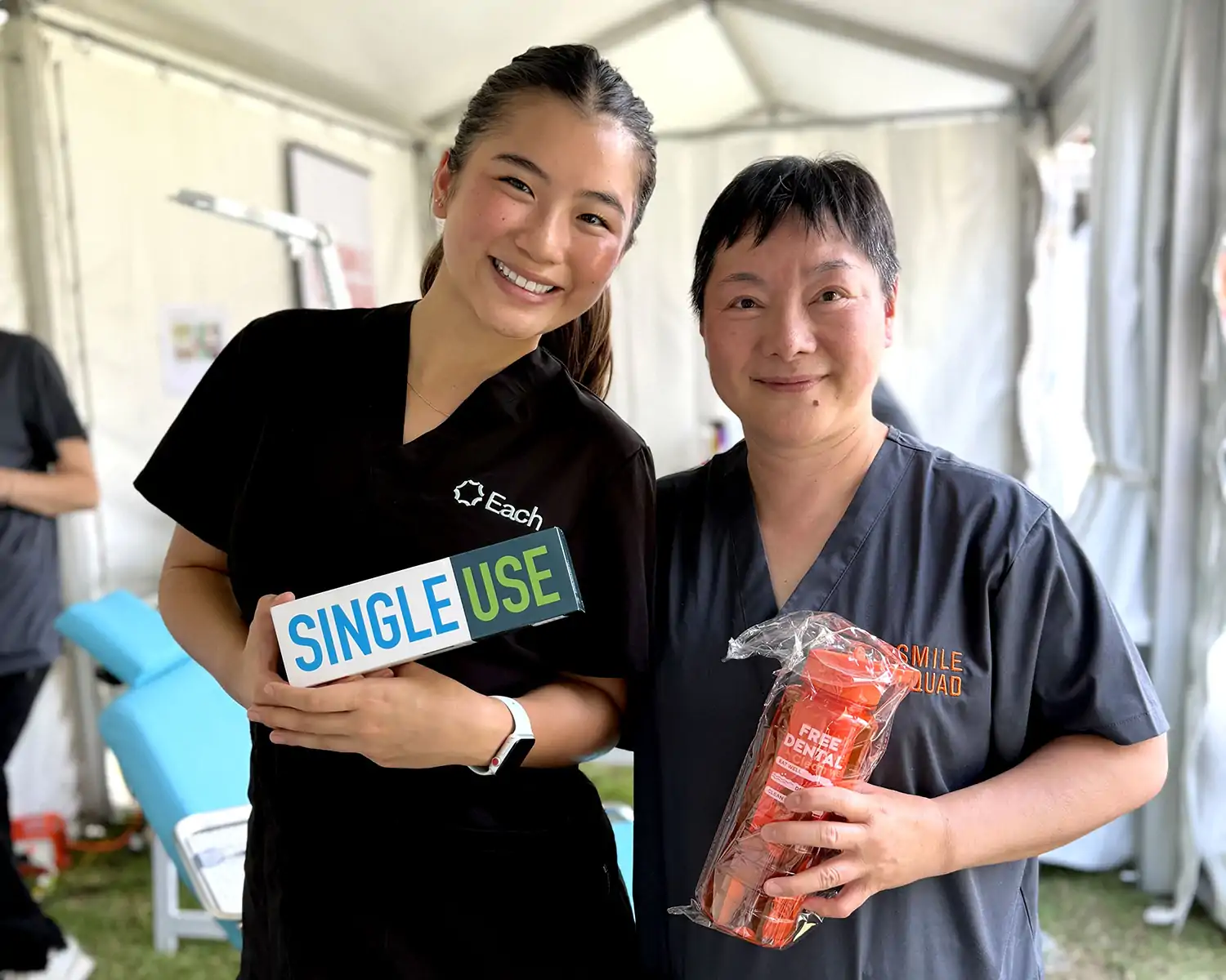 Portrait of two women with Single Use box and waterbottle